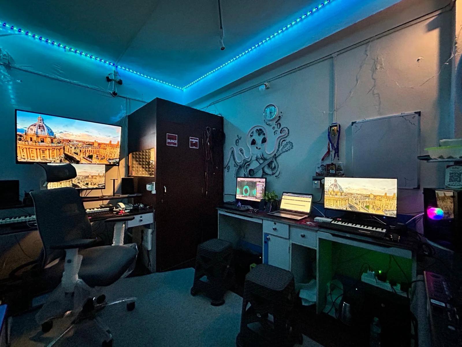 Klaslead production floor with multiple workstations under blue light
