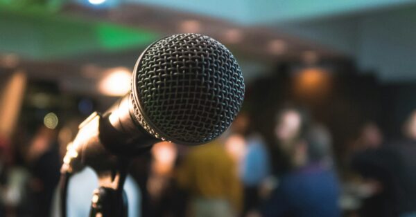 silver corded microphone in shallow focus photography